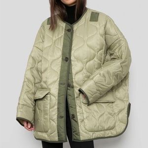 Oversized green quilted jacket